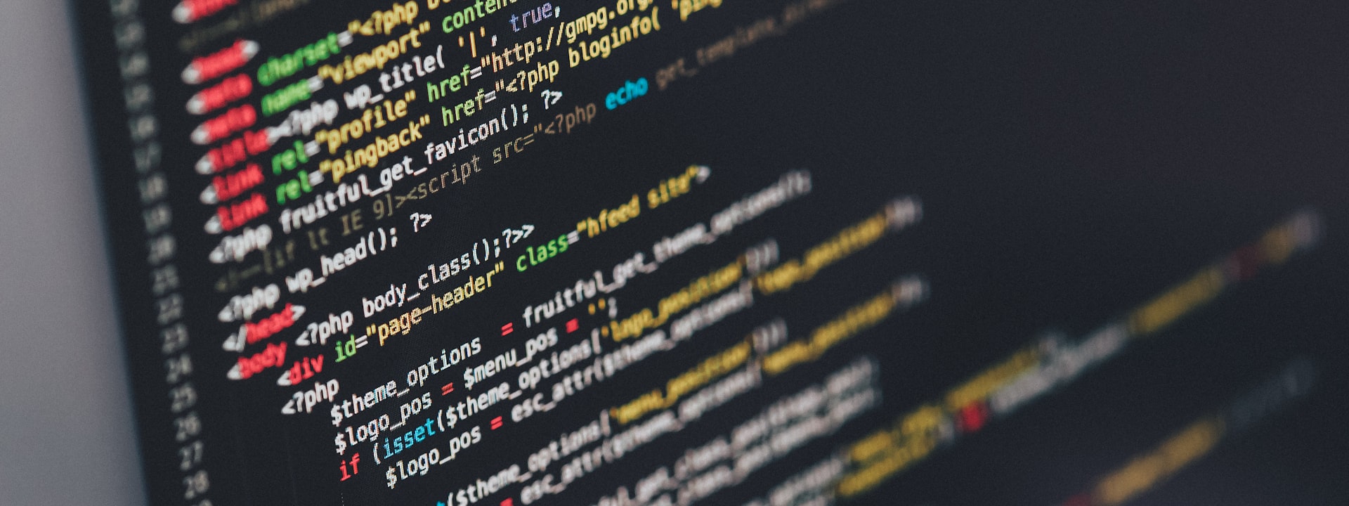 A computer monitor showing lines of code